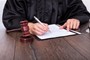 Photo of judge reviewing a document